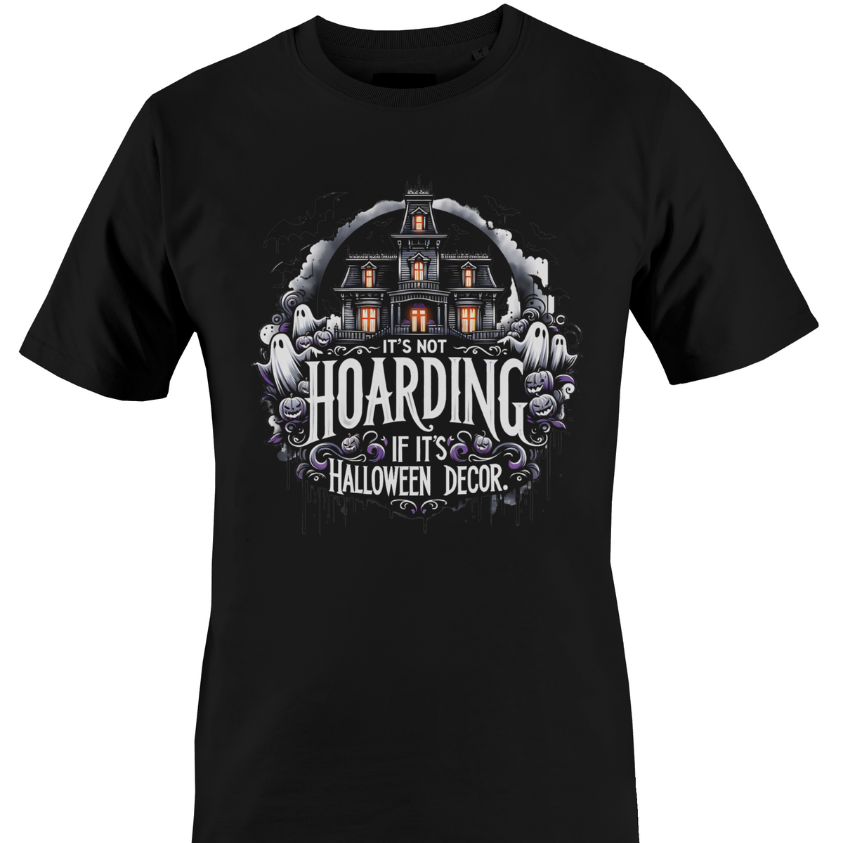A black short-sleeve crewneck t-shirt featuring a Halloween-themed graphic print on the front. The graphic shows a haunted house, ghosts, and purple flowers with the text 'IT'S NOT HOARDING IF IT'S HALLOWEEN DECOR' by Monkey's Creations.
