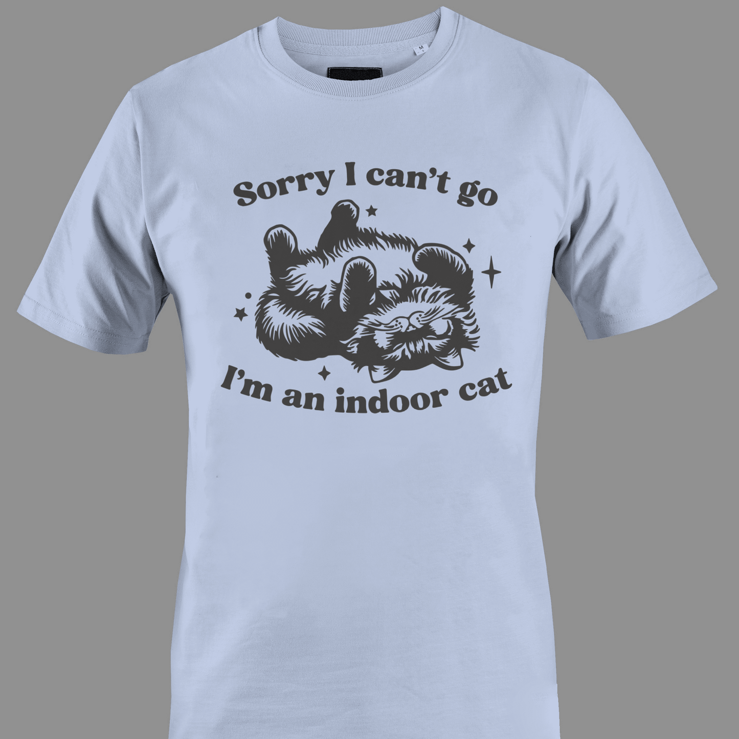 Light blue t-shirt with sleeping cat illustration with text 'Sorry I can't go, I'm an indoor cat' 