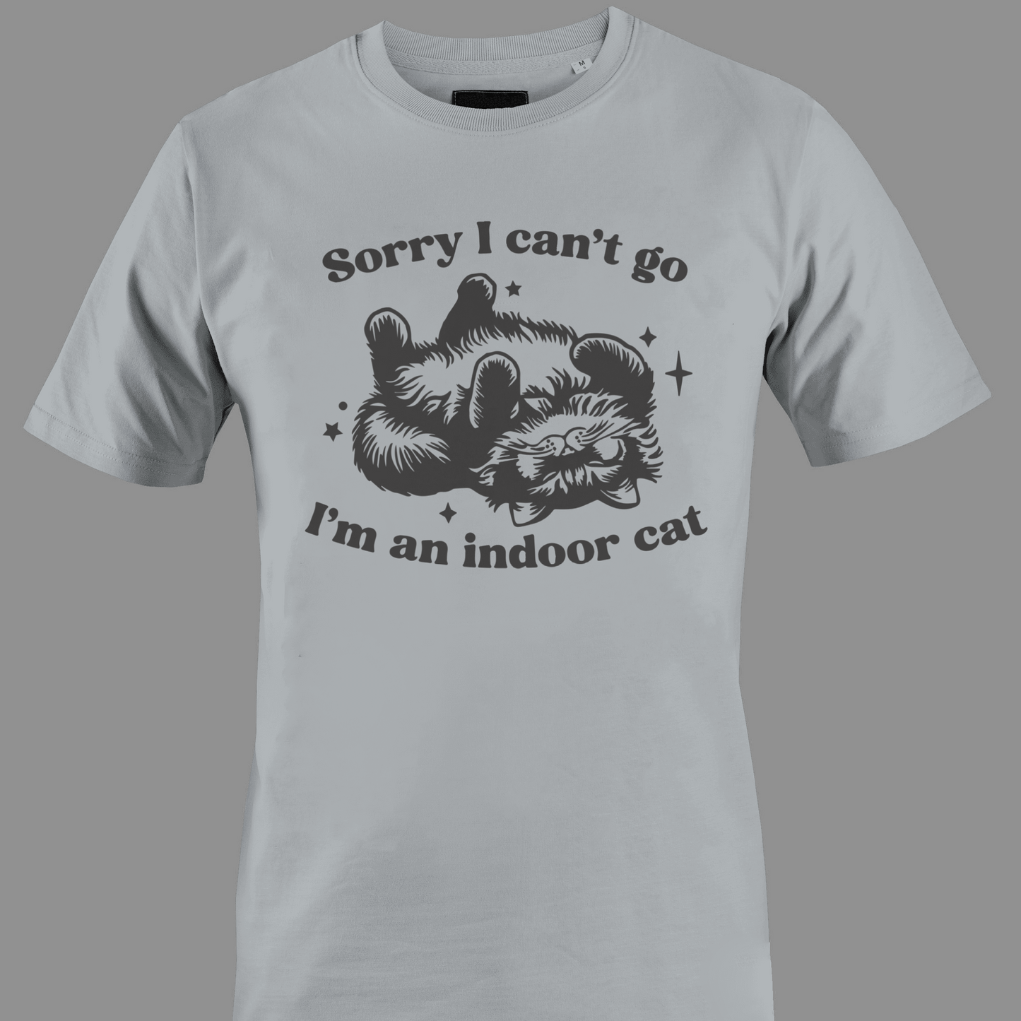 Light gray t-shirt with sleeping cat illustration with text 'Sorry I can't go, I'm an indoor cat' 