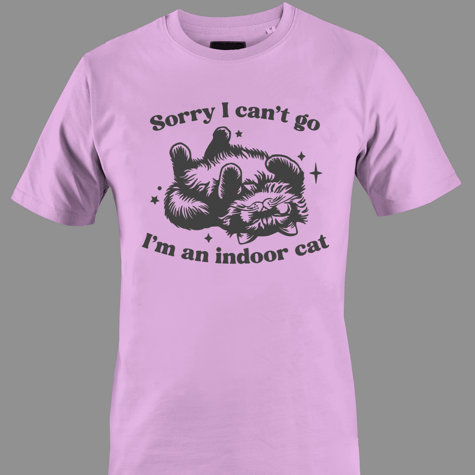 Light pink t-shirt with sleeping cat illustration with text 'Sorry I can't go, I'm an indoor cat' 