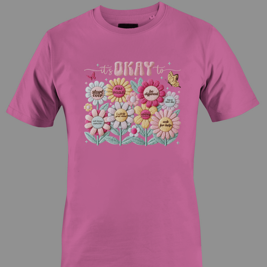 Pink t-shirt with floral design and text It's ok to