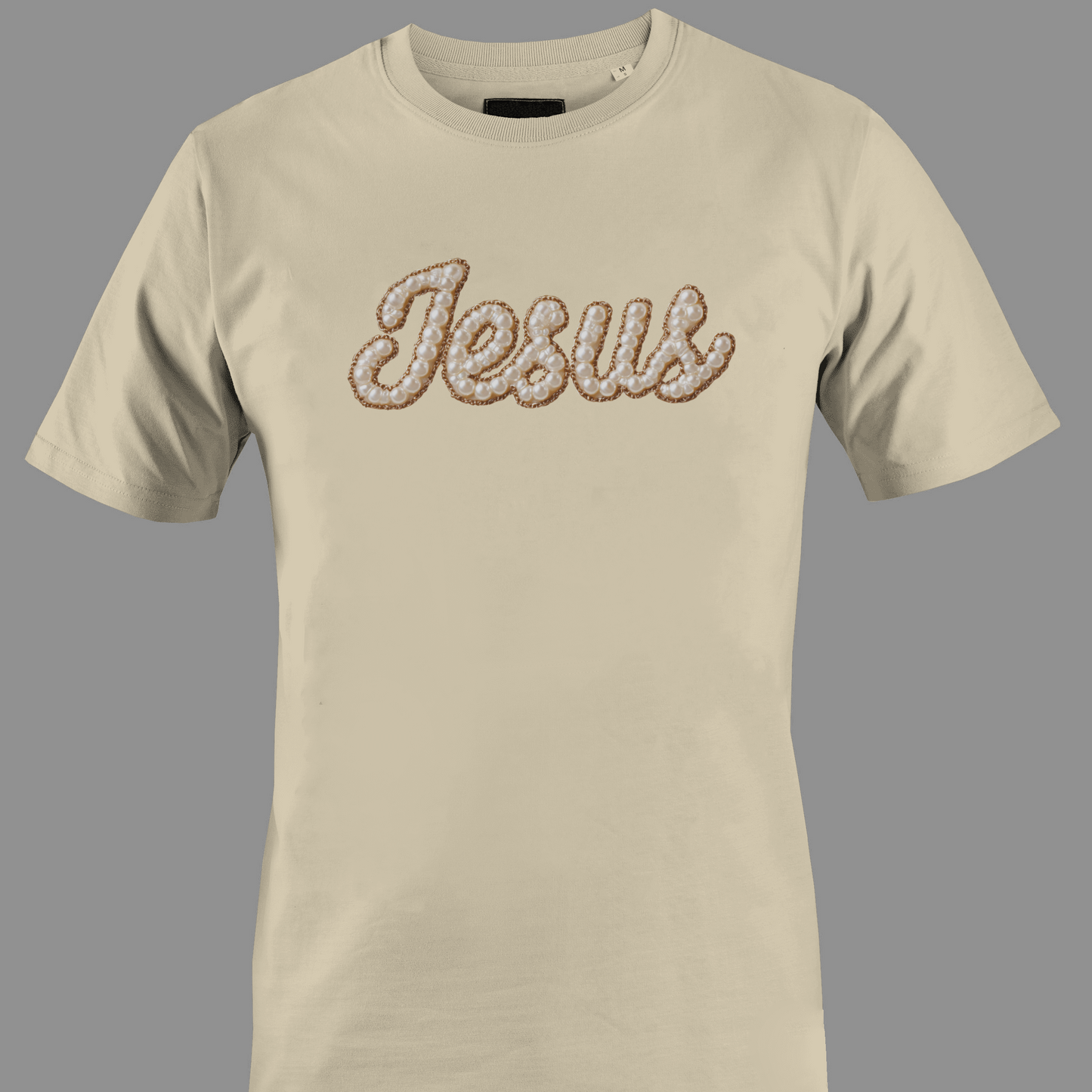 Beige t-shirt with 'Jesus' text