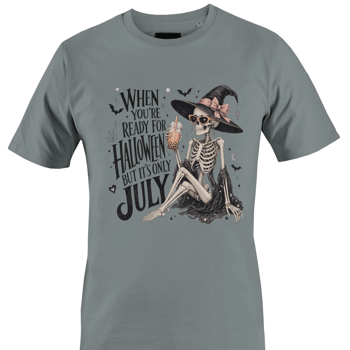 Grey t-shirt with skeleton witch design and text "when you're ready for Halloween but it's only July" by Monkey's Creations. 