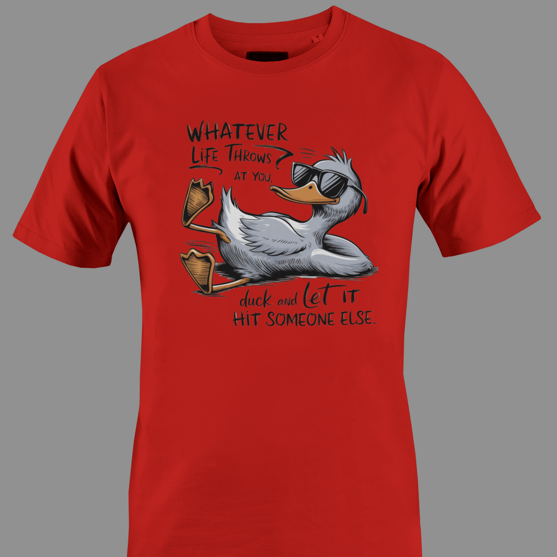 Red t-shirt with a cartoon duck graphic and text whatever life throws at you