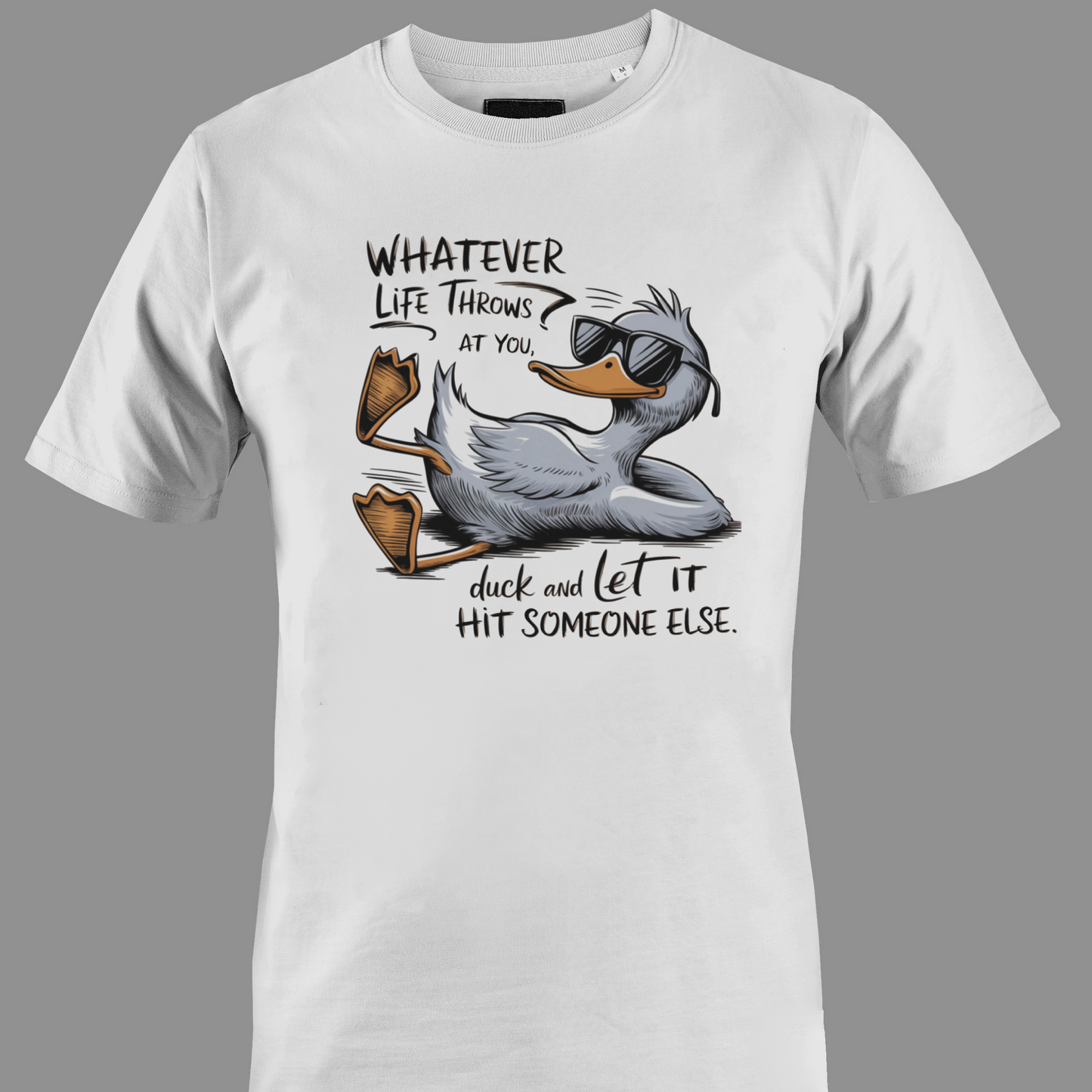 White t-shirt with a cartoon duck graphic and text whatever life throws at you