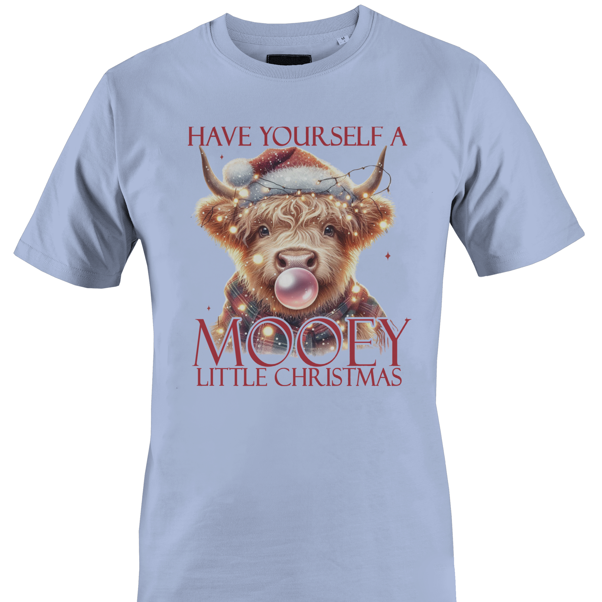 Light bluet-shirt with a cow in a Santa hat and the text "have yourself a mooey little Christmas" by Monkey's Creations.