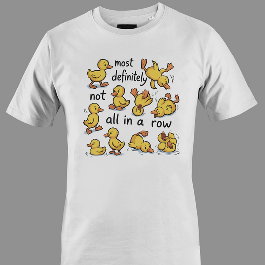 White t-shirt with yellow ducklings and text most definitely not all in a row