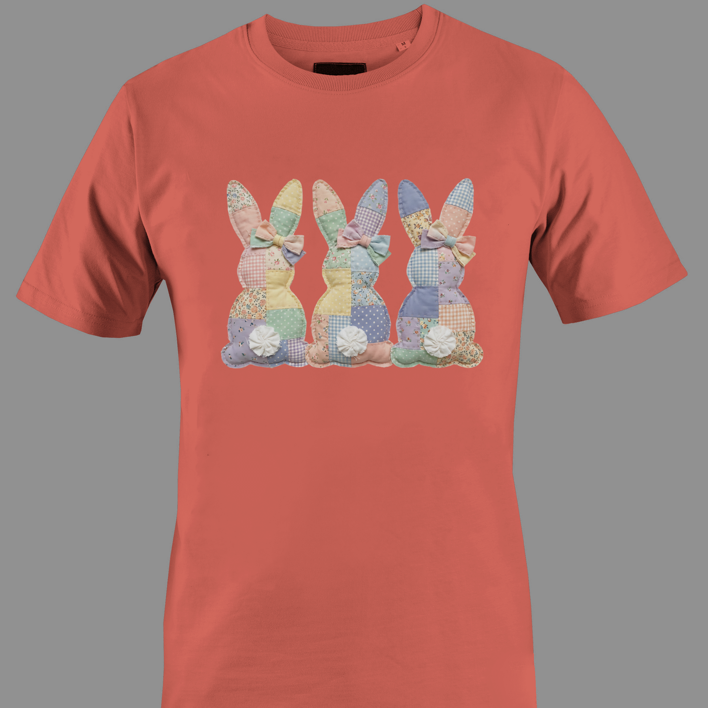Coral t-shirt with a trio of patchwork bunnies