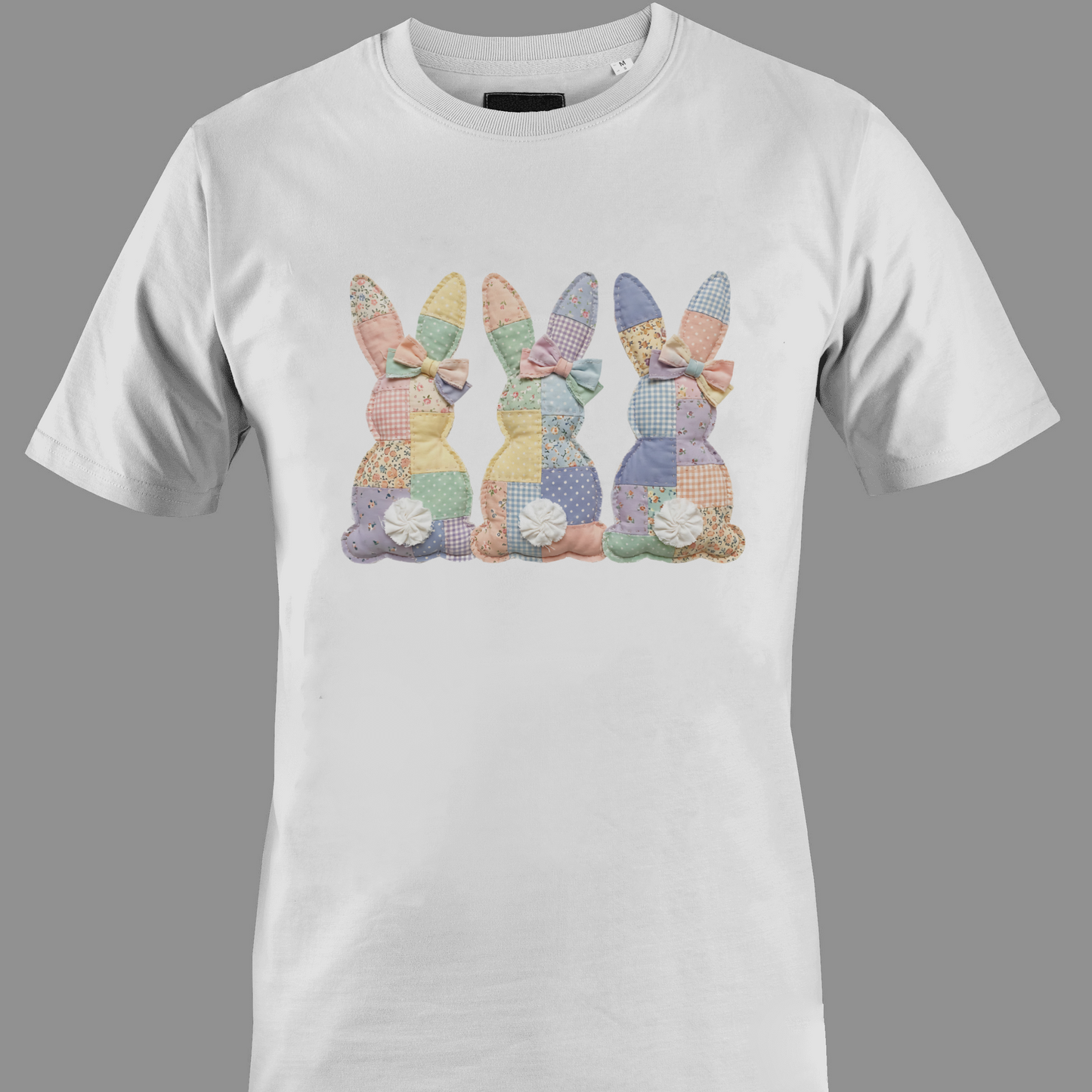 White t-shirt with a trio of patchwork bunnies