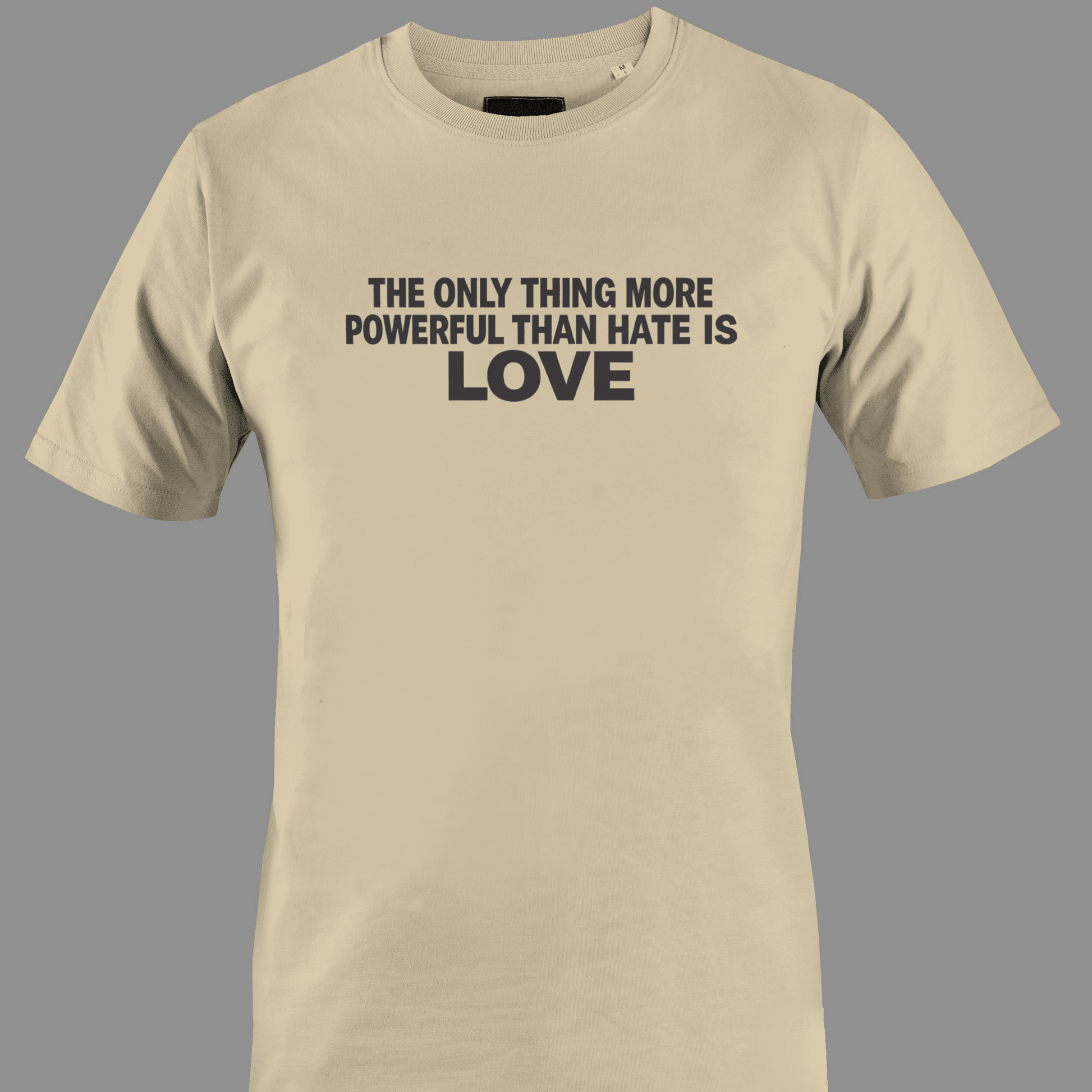 Beige t-shirt with text the only thing more powerful than love is hate 
