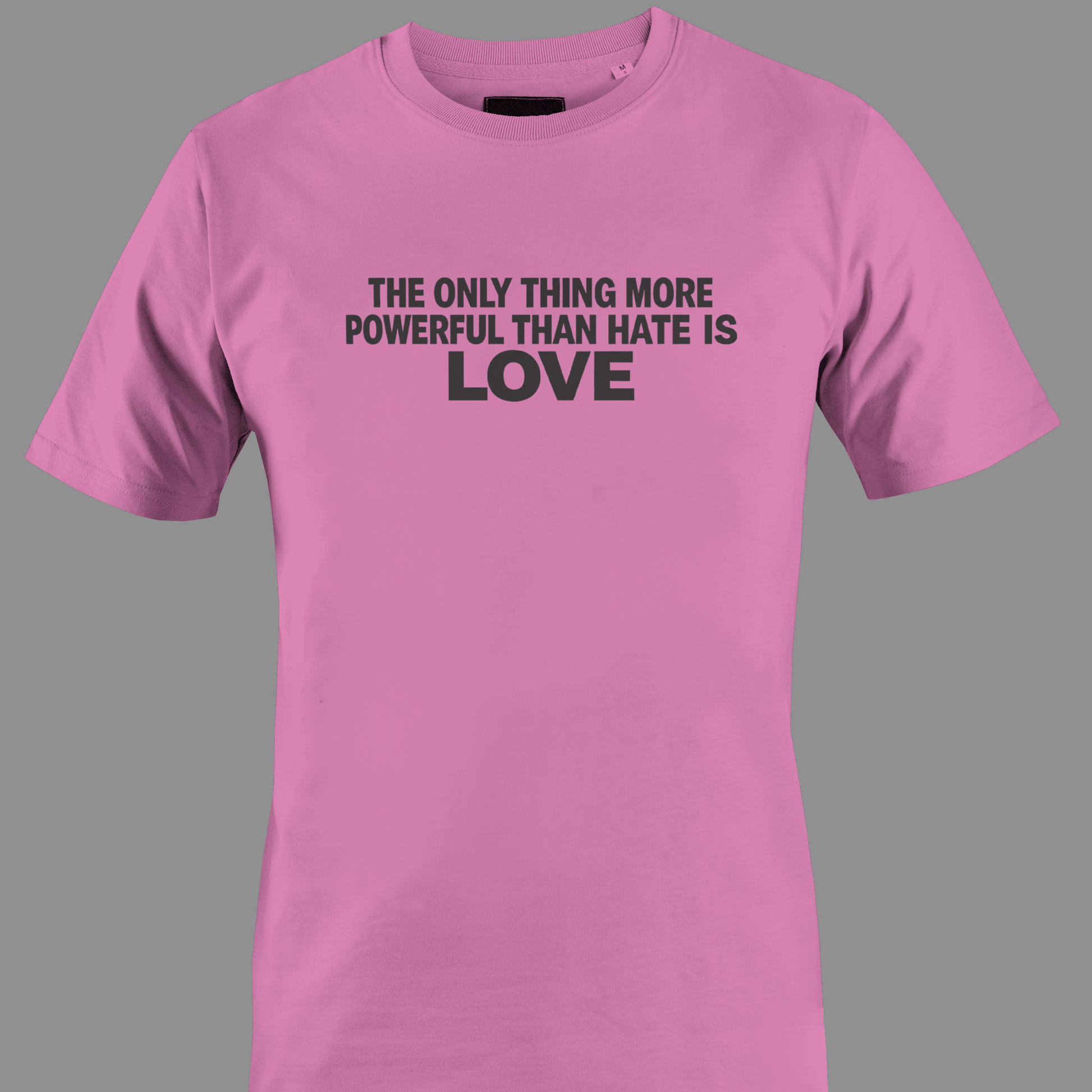 Dark pink t-shirt with text the only thing more powerful than love is hate 