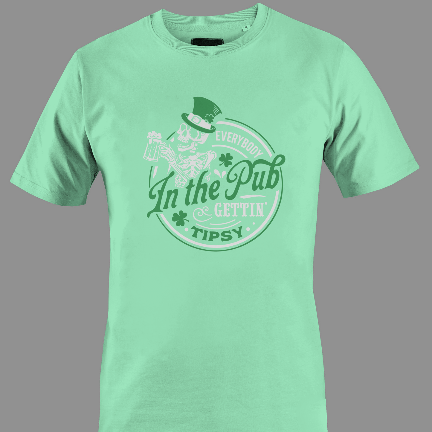 Green t-shirt with a skeleton and text in the pub gettin tipsy