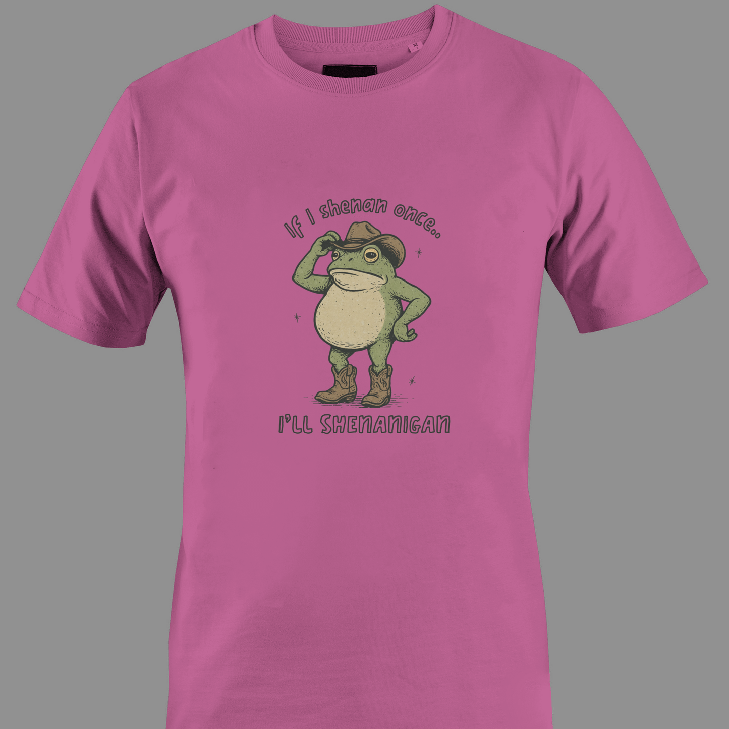 Dark pink t-shirt with a graphic of a frog wearing a cowboy hat and text saying shenan once, shenanigan