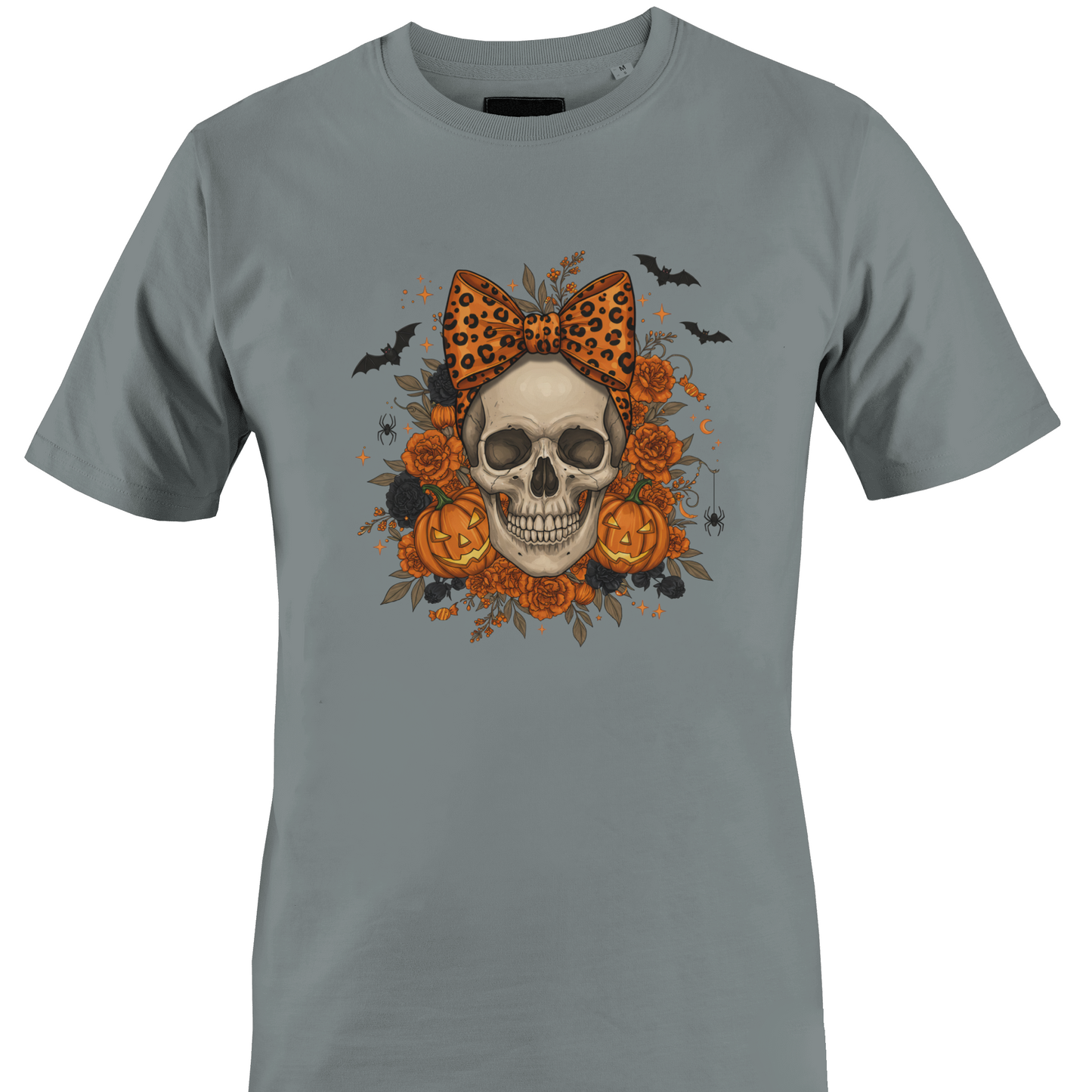 Grey  t-shirt with a skull wearing an orange leopard print bow surrounded by black and orange roses and jack o lanterns for Halloween by Monkey's Creations. 
