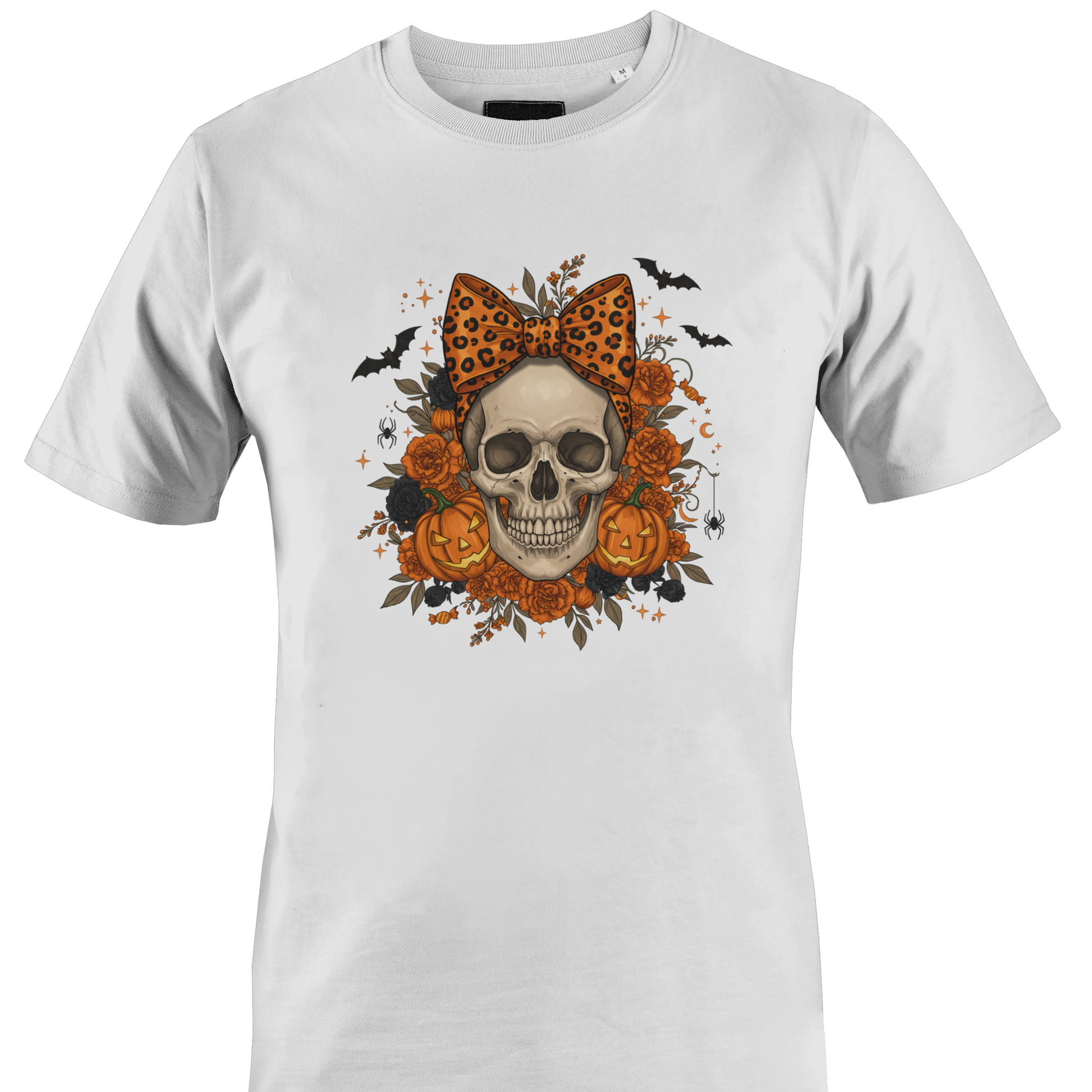 White t-shirt with a skull wearing an orange leopard print bow surrounded by black and orange roses and jack o lanterns for Halloween by Monkey's Creations. 
