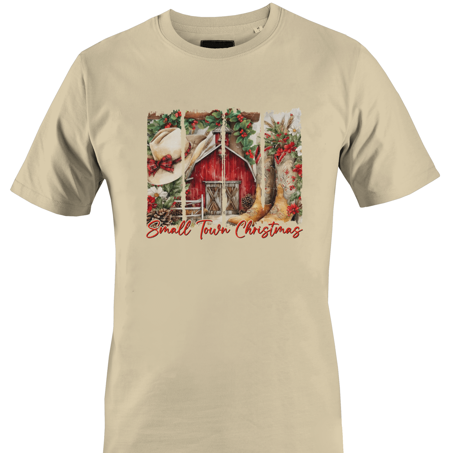 Tan t-shirt with a barn, cowboy hat and boots with the text "small town Christmas by Monkey's Creations. 