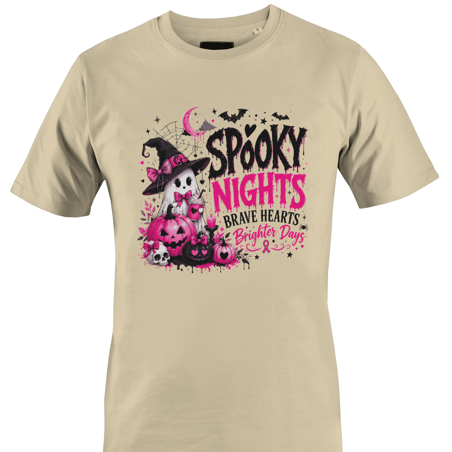Tan t-shirt with a ghost surrounded by pink and black pumpkins and the text "spooky nights - brave hearts - brighter days" and a breast cancer awareness pink ribbon by Monkey's Creations. 