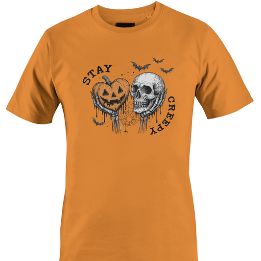Orange t-shirt with Halloween-themed elements and the text "stay Creepy by Monkey's Creations. 