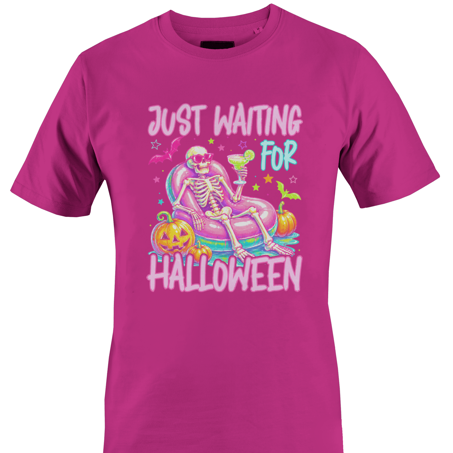 Pink t-shirt with a colorful skeleton on a pool floatie with Halloween elements and text 'Just Waiting for Halloween' by Monkey's Creations. 