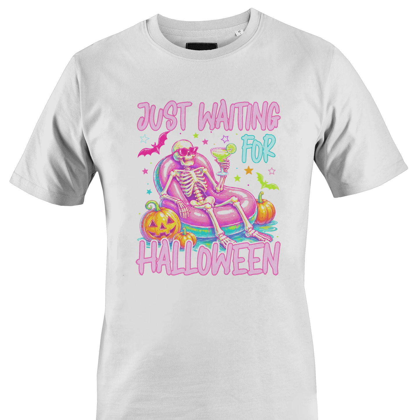White t-shirt with a colorful skeleton on a pool floatie with Halloween elements and text 'Just Waiting for Halloween' by Monkey's Creations. 