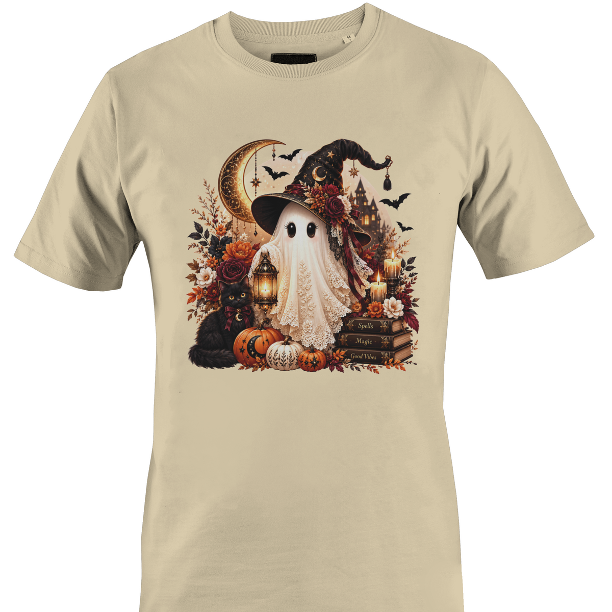 A beige short-sleeve crewneck t-shirt featuring a detailed Halloween graphic depicting a white ghost wearing a witch's hat, surrounded by pumpkins, a black cat, candles, books, and a crescent moon by Monkey's Creations.