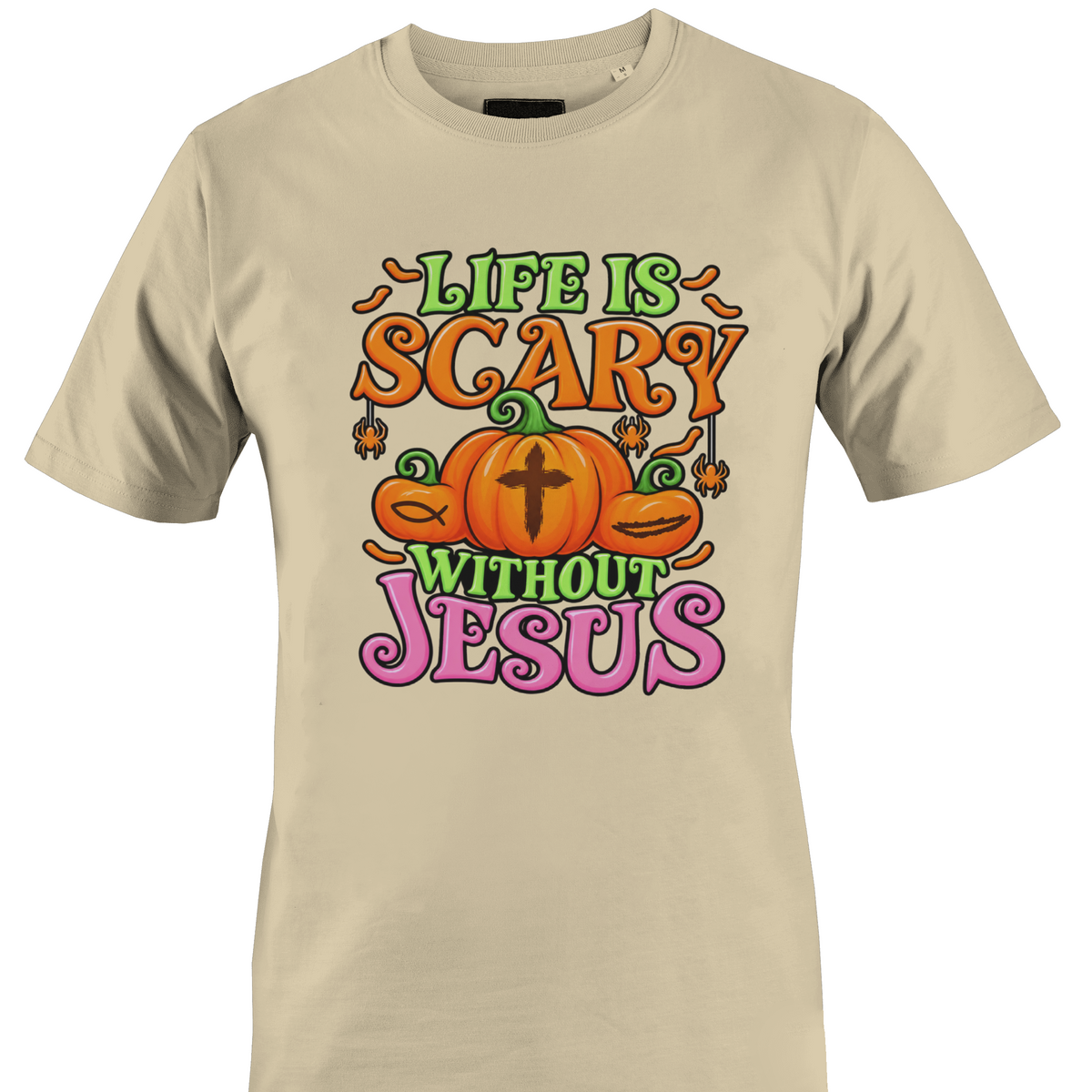 A beige short-sleeve crewneck t-shirt featuring colorful pumpkins and religious symbols on the front with the text 'LIFE IS SCARY WITHOUT JESUS' in orange, green, and pink lettering by Monkey's Creations.