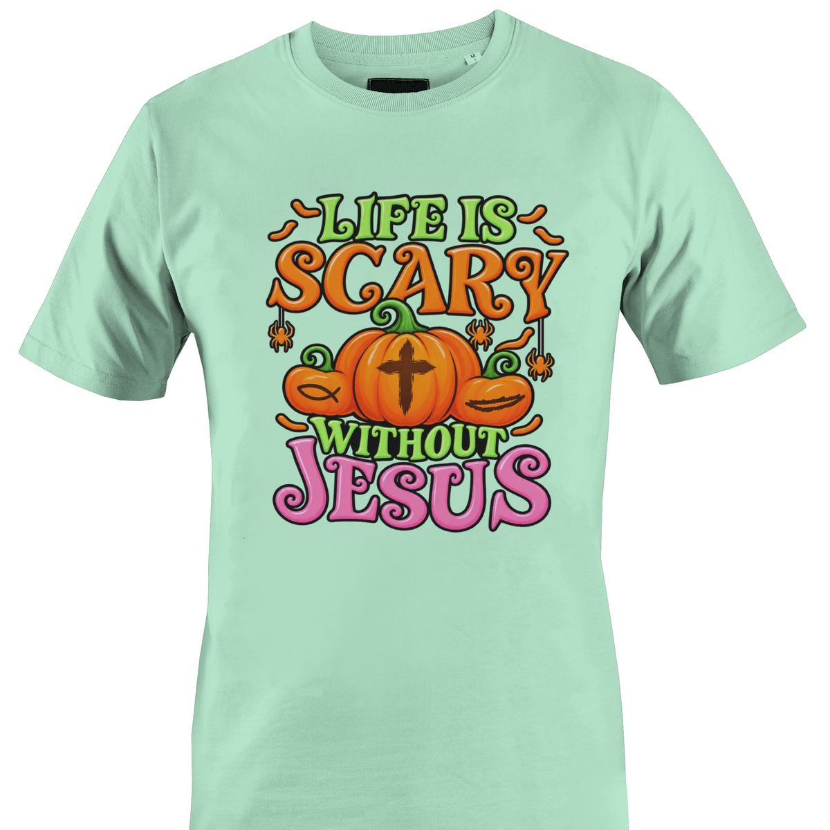A mint green short-sleeve crewneck t-shirt featuring colorful pumpkins and religious symbols on the front with the text 'LIFE IS SCARY WITHOUT JESUS' in orange, green, and pink lettering by Monkey's Creations.