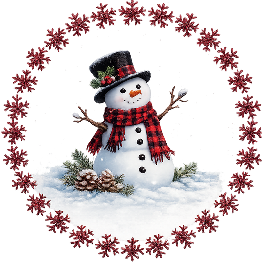 Round metal wreath sign with a buffalo plaid snowman and pine combs by Monkey's Creations. 