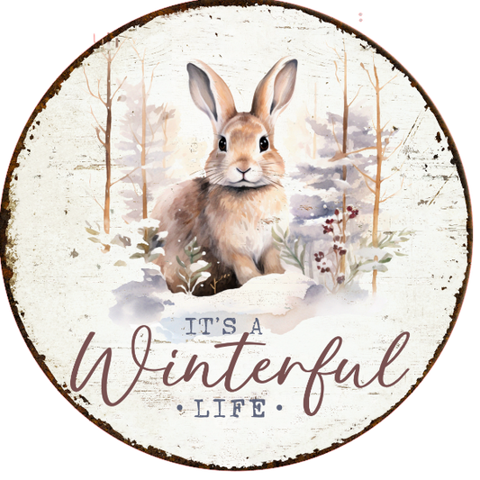 Rabbit in a snowy scene and 'It's a Winterful Life' text on a white background