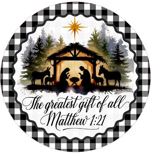 Nativity scene with checkered border and 'The greatest gift of all - Matthew 1:21' text on a white background