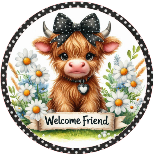 Metal wreath sign with a highland cow with a bow and 'Welcome Friend' surrounded by flowers by Monkey's Creations.