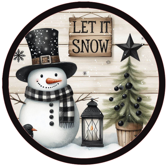 Round metal wreath sign with text "let it snow" vintage snowman with a Christmas tree with black ornaments and winter elements by Monkey's Creations.