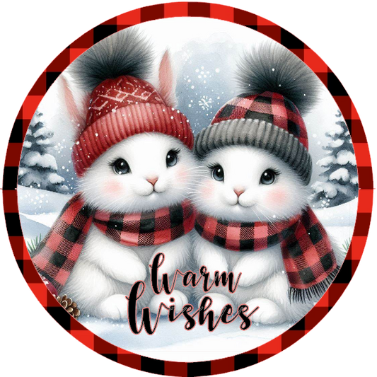 Two cute animated bunnies wearing winter hats and scarves with 'Warm Wishes' text on a snowy background.