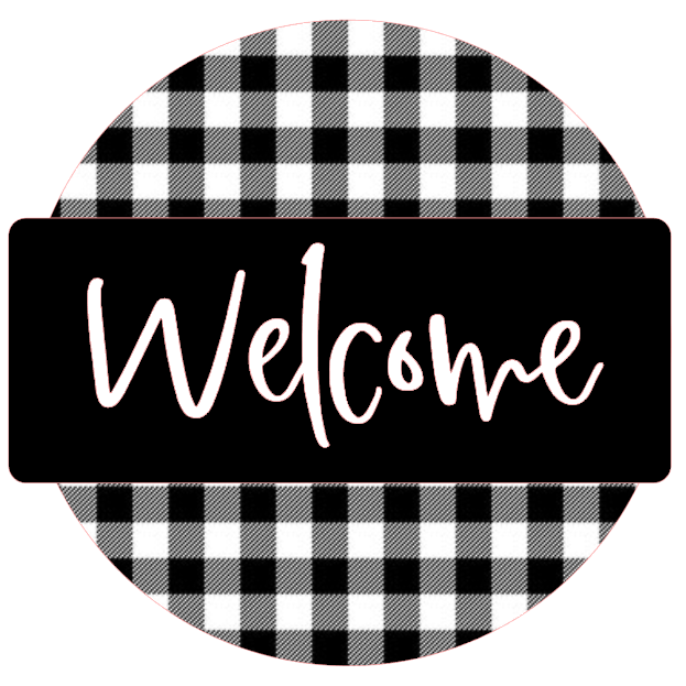 Round black and white checkered sign with 'Welcome' text