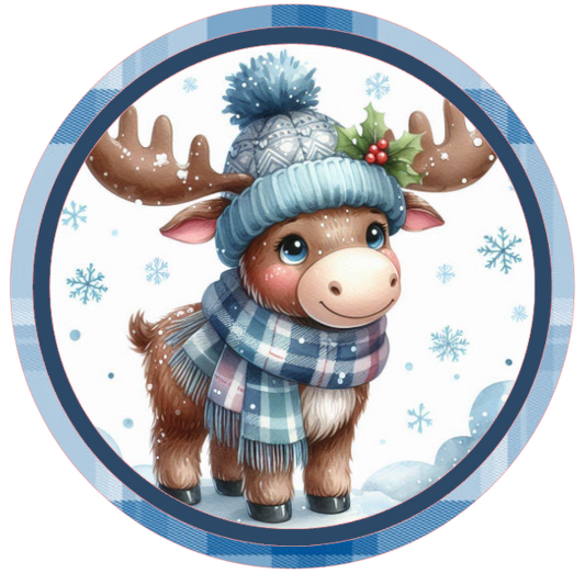 Illustration of a moose wearing a hat and scarf in a circular frame with snowflakes on a white background