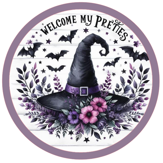 Halloween witch hat, flowers, and welcome my pretties text 