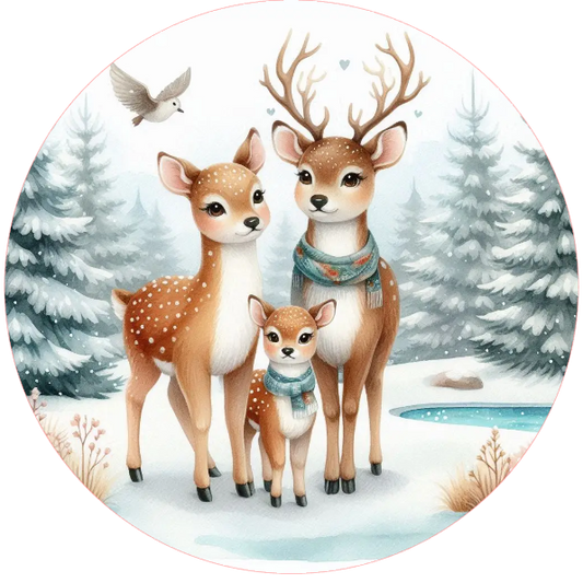 Family of deer in a snowy landscape with trees and water.