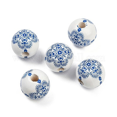 White painted round wooden beads with blue chinoiserie style pattern for crafting and wreath making.