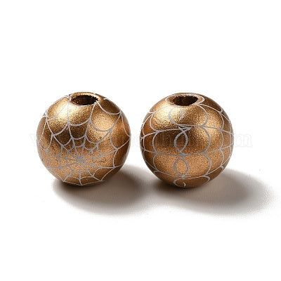 Painted round gold wooden beads with white cobwebs for crafting and wreath making.
