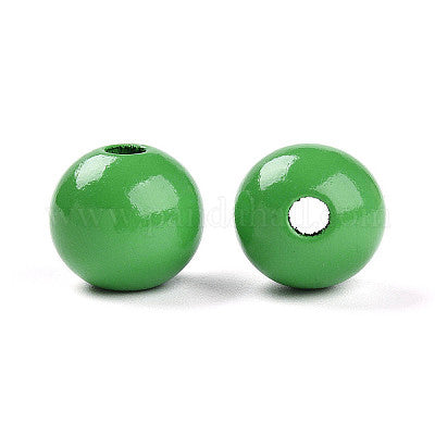Painted green wooden beads for crafting and wreath making