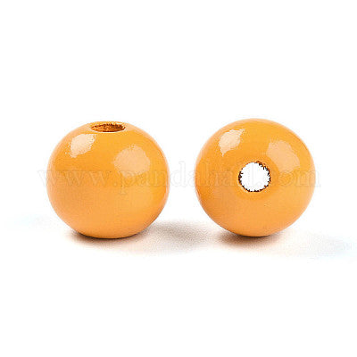 Painted orange wooden beads for crafting and wreath making