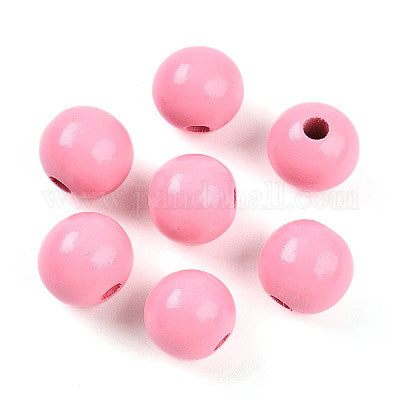 Painted pink wooden beads for crafting and wreath making