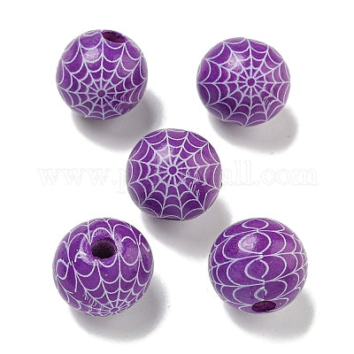 Painted purple wooden beads with white spider webs for crafting and wreath making 