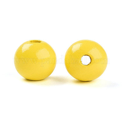 Painted bright yellow wooden beads for crafting and wreath making