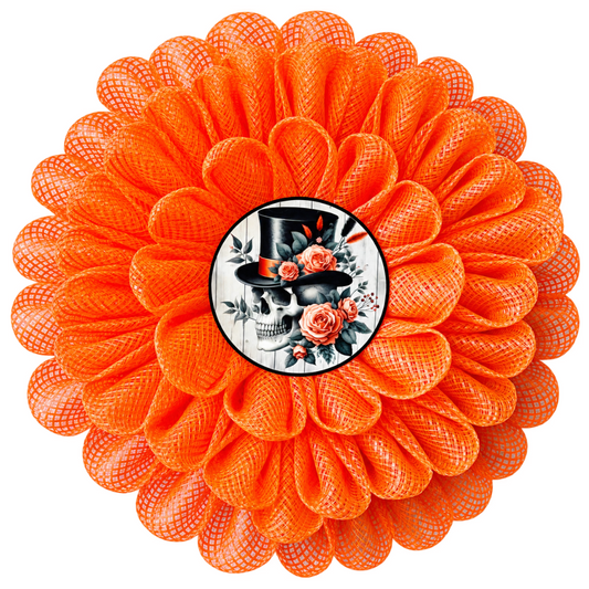 An orange deco mesh 3D flower wreath with a skull and roses center for Halloween by Monkey's Creations.