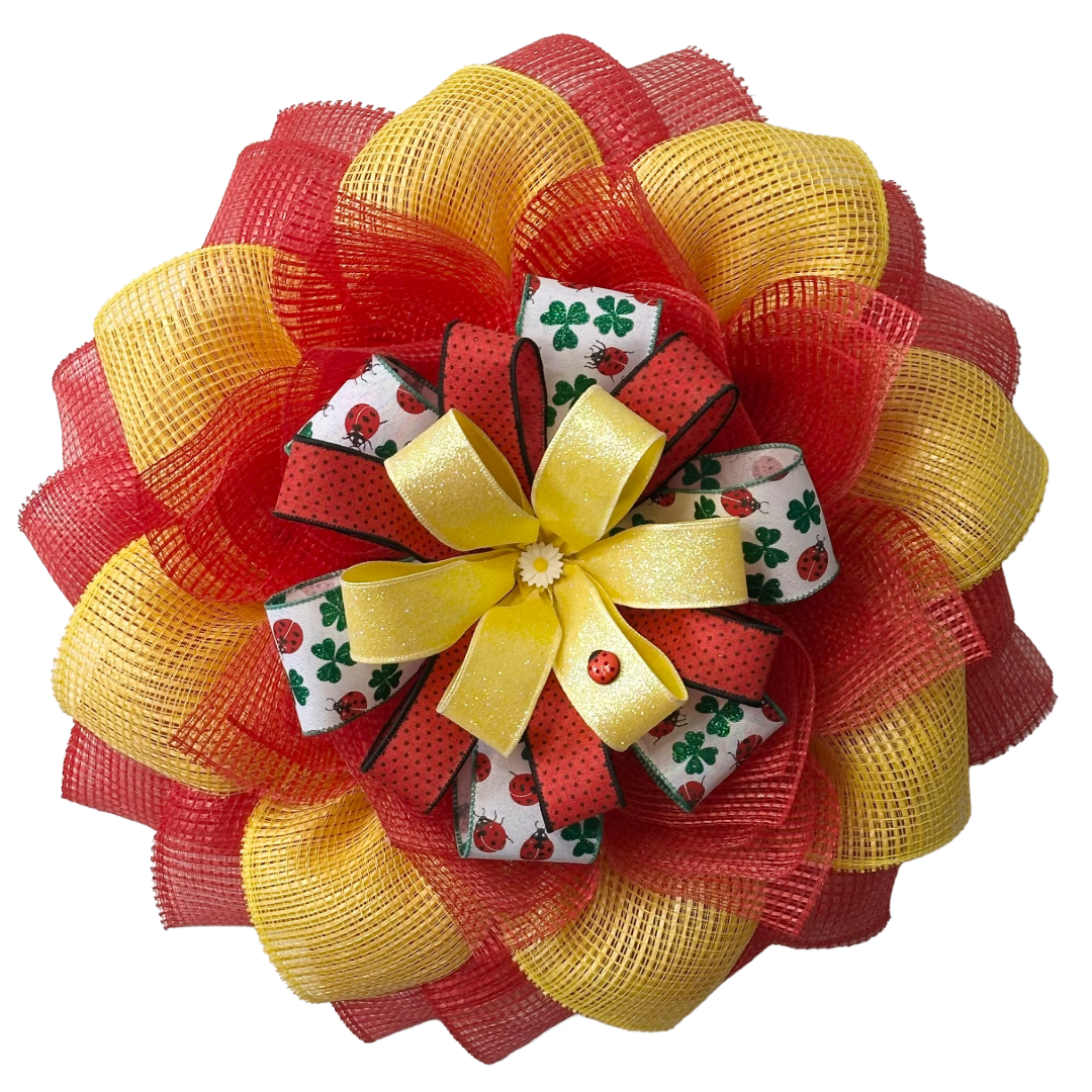 Red and yellow deco mesh flower wreath with a ribbon center and spring elements by Monkey's Creations