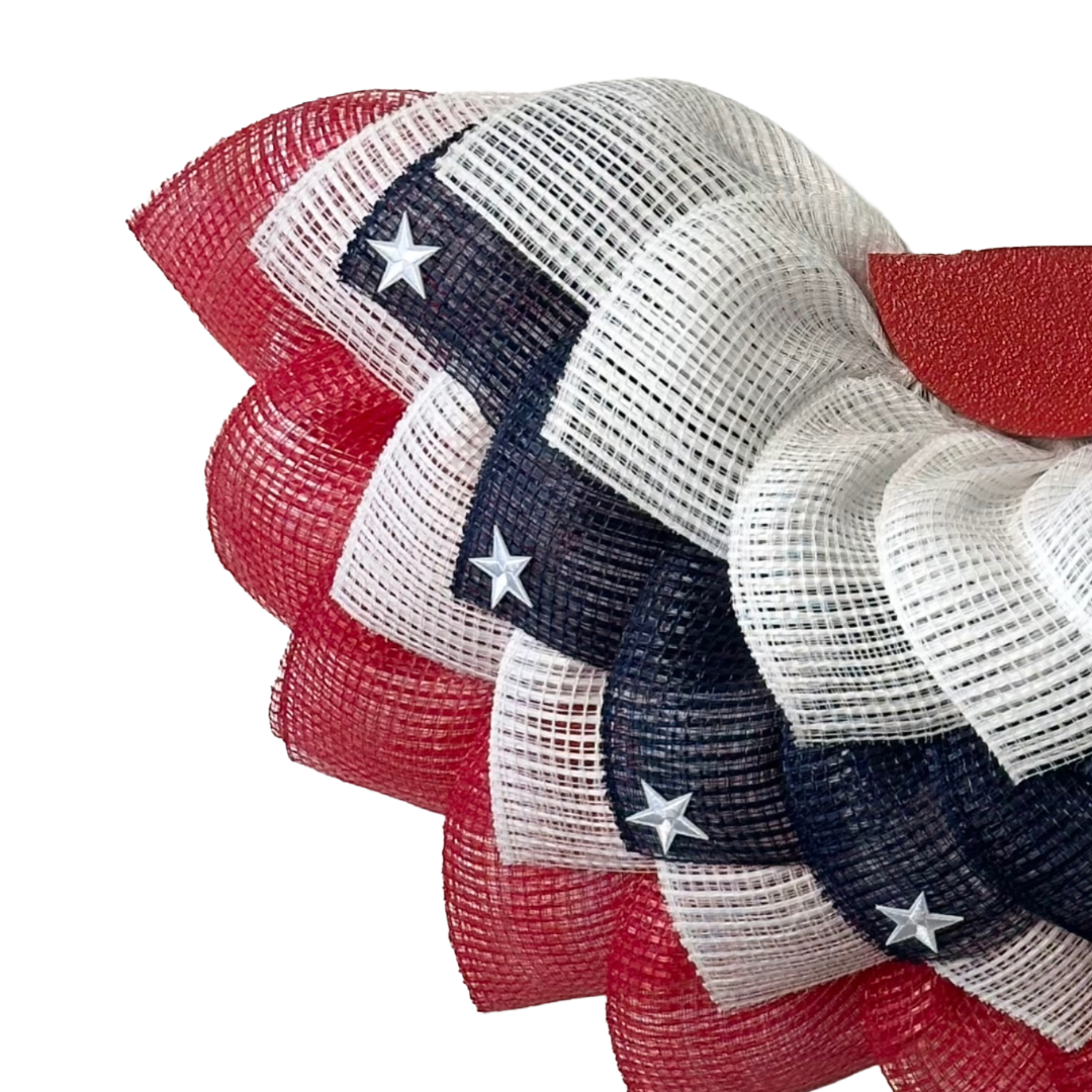 Americana bunting wreath with red white and blue deco mesh with stars by Monkey's Creations.