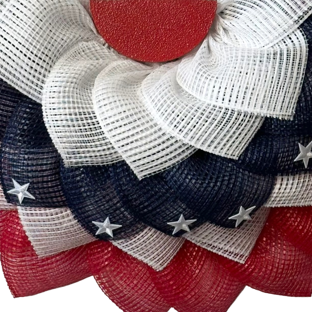 Americana bunting wreath with red white and blue deco mesh with stars by Monkey's Creations.