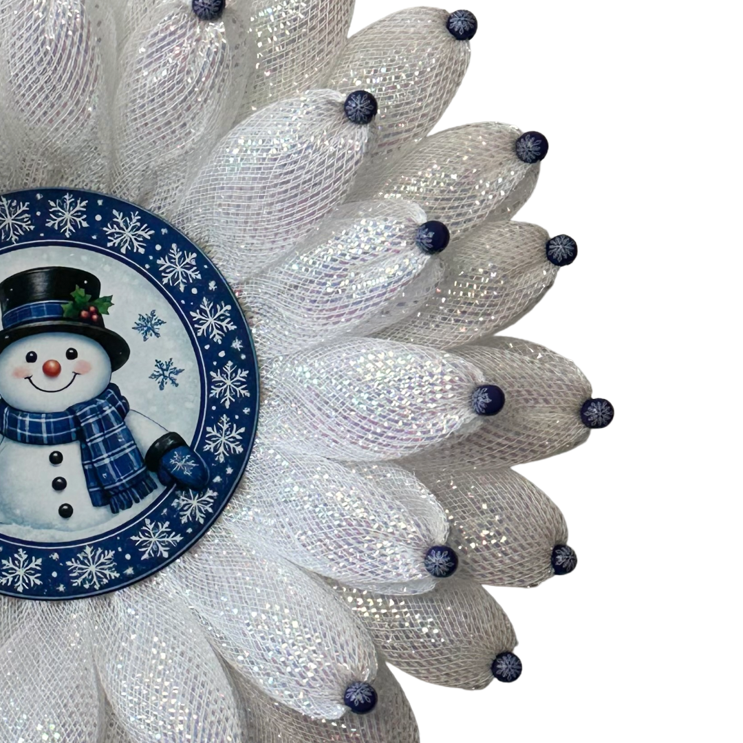 White deco mesh beaded 3D flower wreath with a blue snowman center by Monkey's Creations - Christmas in July.