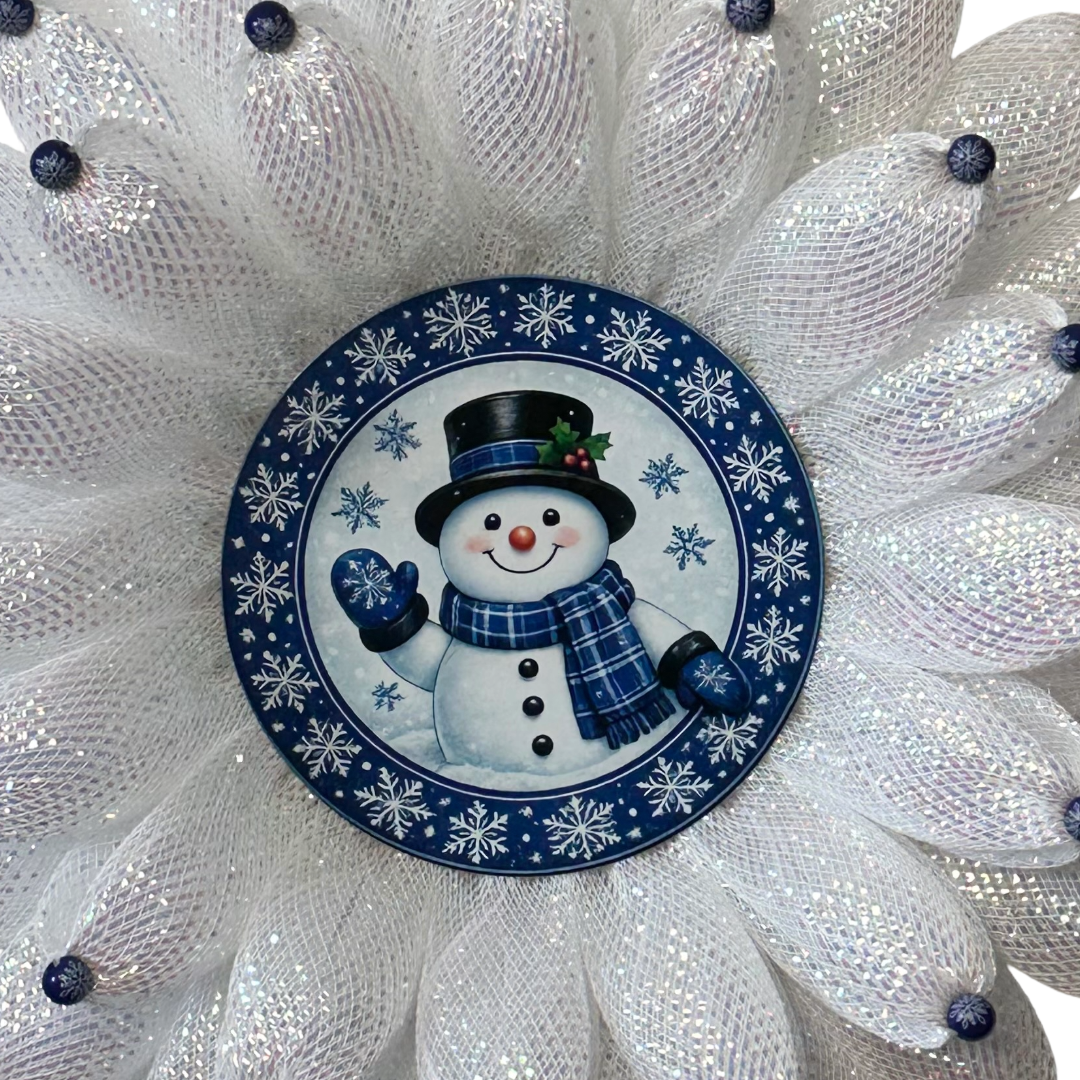 White deco mesh beaded 3D flower wreath with a blue snowman center by Monkey's Creations - Christmas in July.